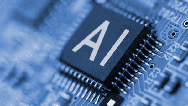 Close-up of an AI-labeled chip on a blue circuit board